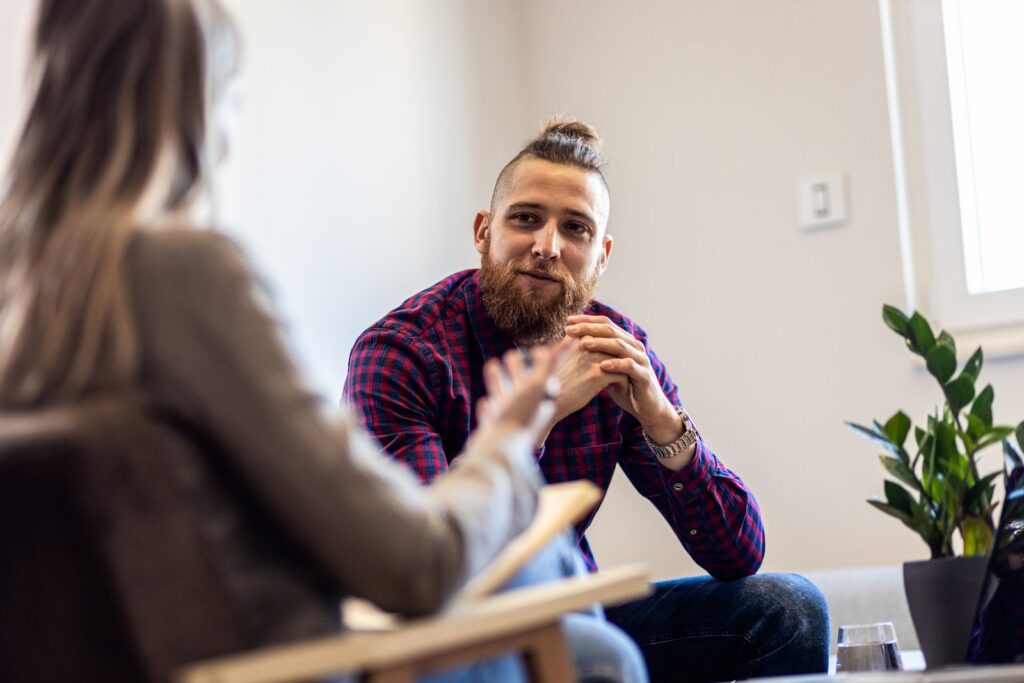 Patient in consultation with a clinician at D2 Human Performance in Columbus, Georgia