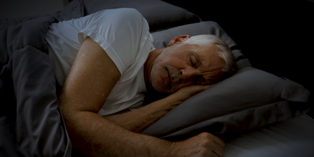 Older man sleeping soundly